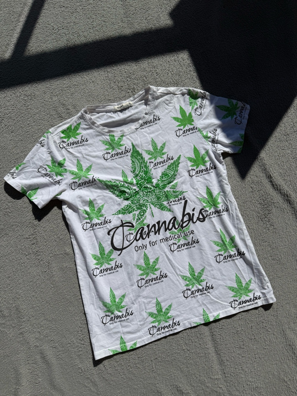 Vintage White T‑Shirt with Green Cannabis Leaf Print